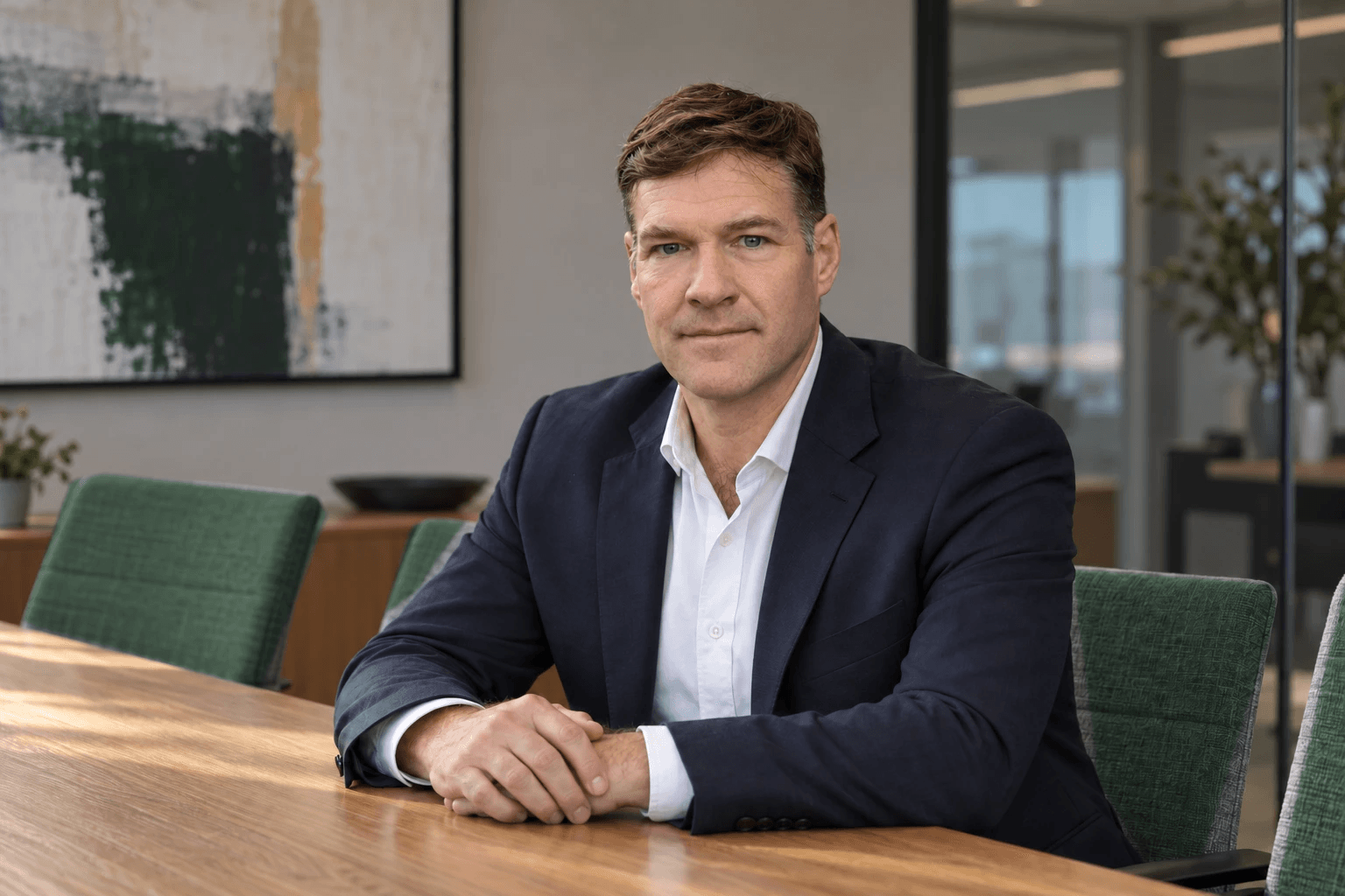 Ian White, Chief Technical Officer and Head of Special Projects at Stratton, seated at a boardroom table.